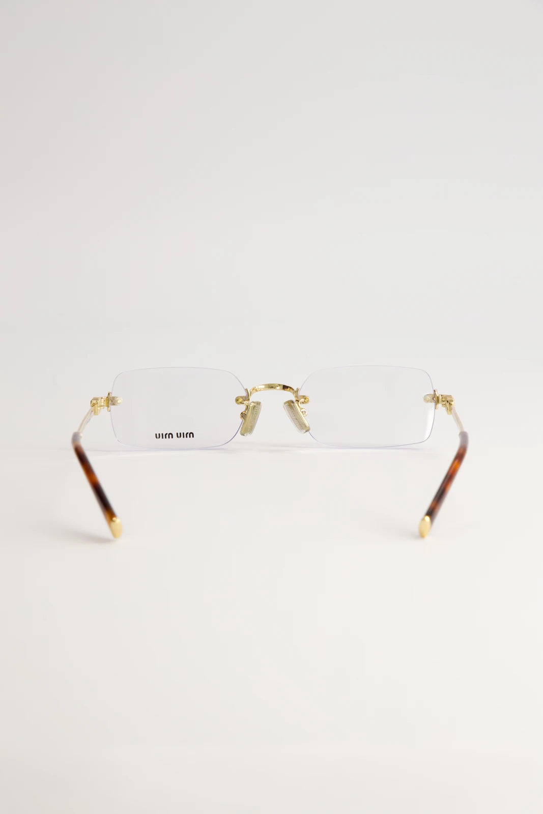 Lentes de Sol Miu Miu Logo Gold SMUA54