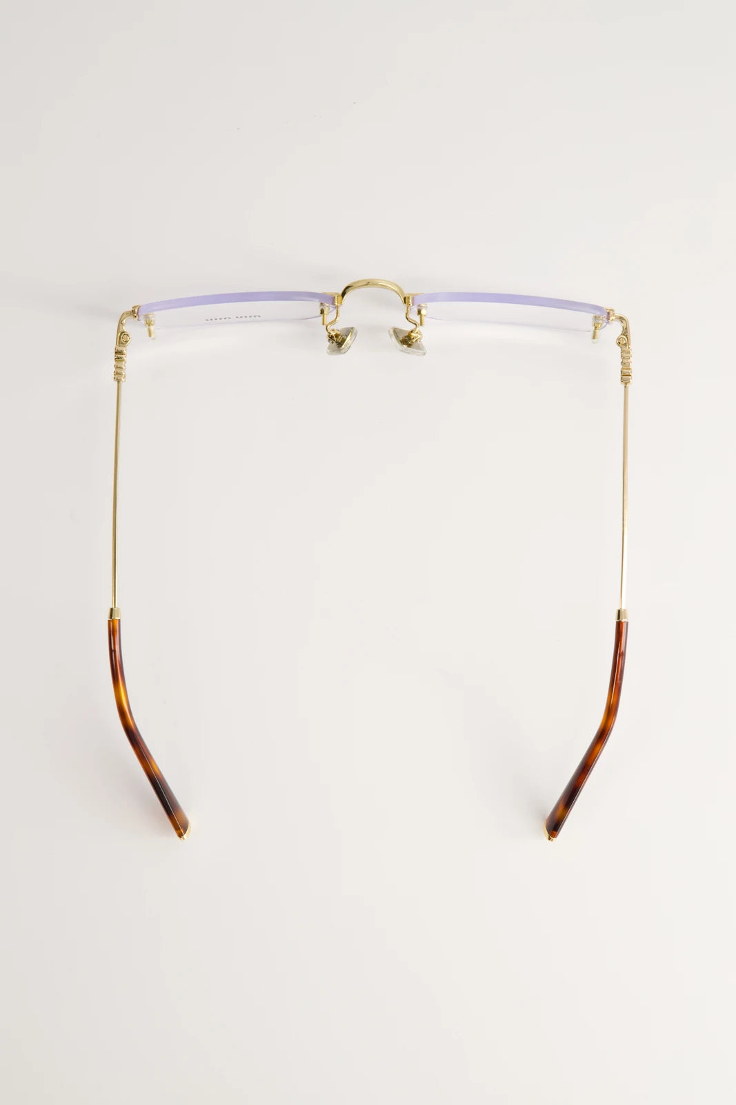 Lentes de Sol Miu Miu Logo Gold SMUB50
