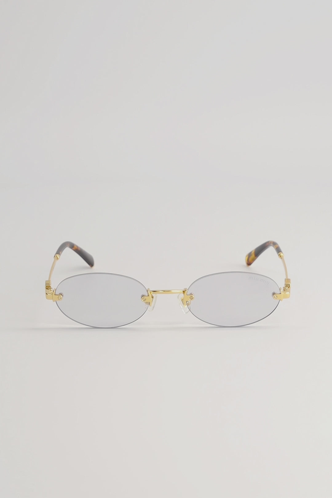 Lentes de Sol Miu Miu Logo Gold SMUA54