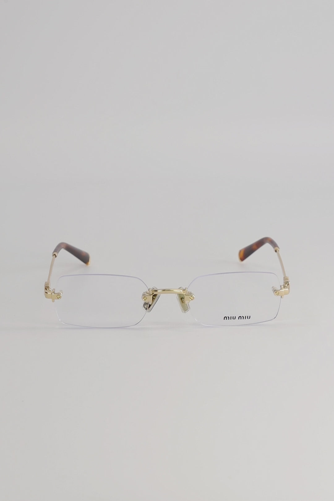 Lentes de Sol Miu Miu Logo Gold SMUB50