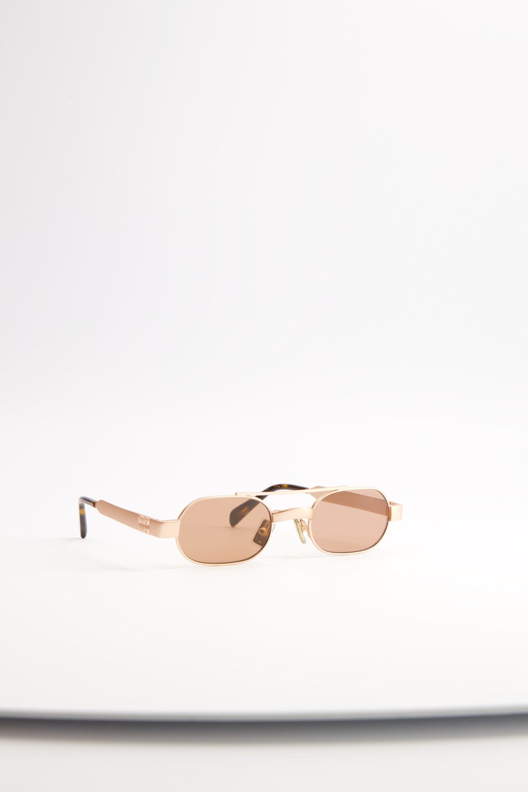Lentes de Sol Miu Miu Envie