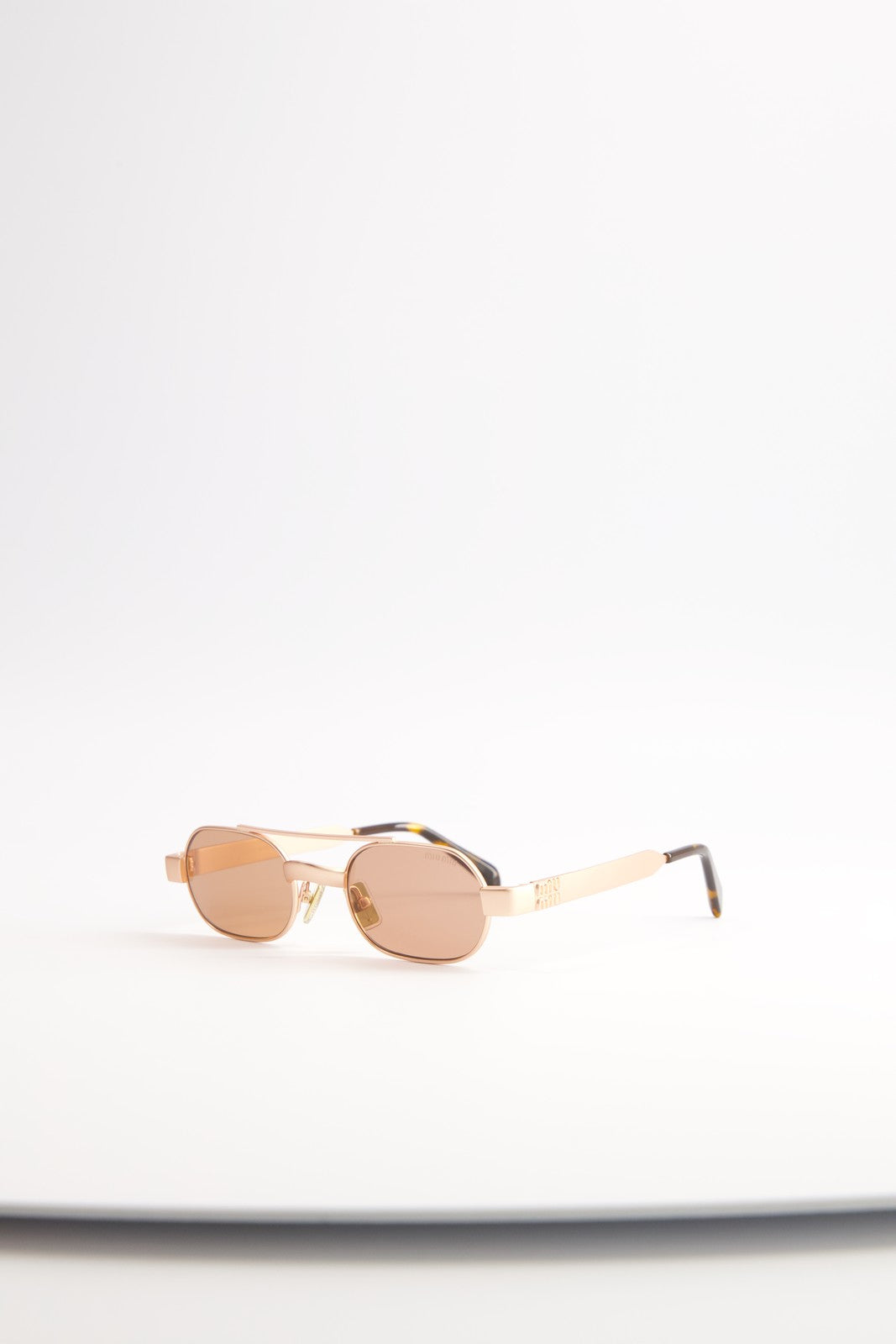 Lentes de Sol Miu Miu Envie