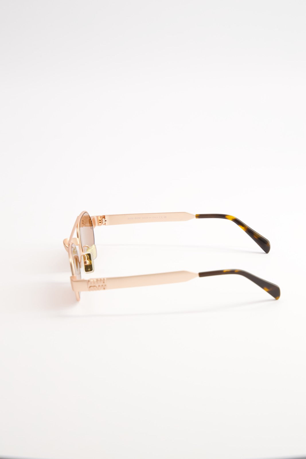 Lentes de Sol Miu Miu Envie