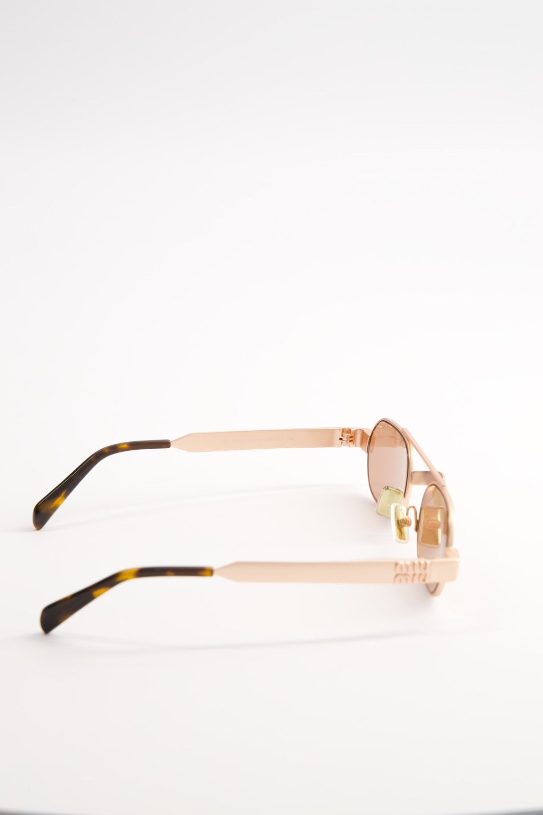 Lentes de Sol Miu Miu Envie