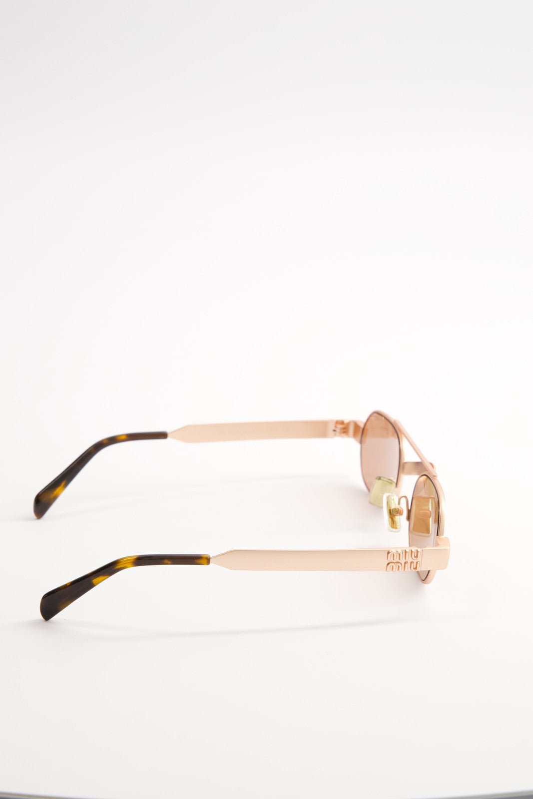 Lentes de Sol Miu Miu Envie